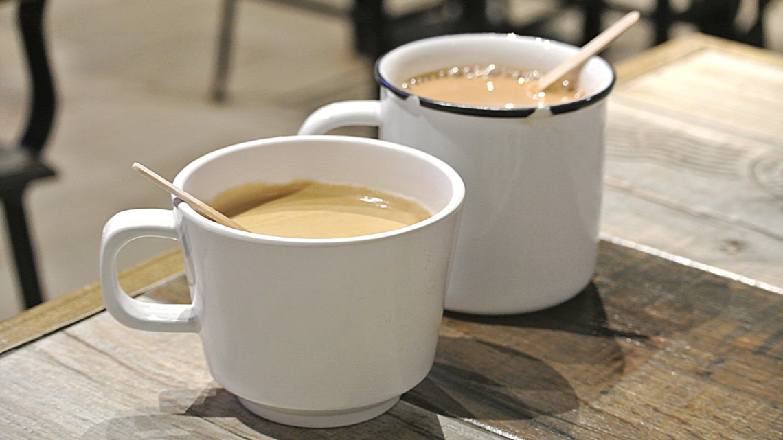 photo of 2 mugs of tea or coffee.