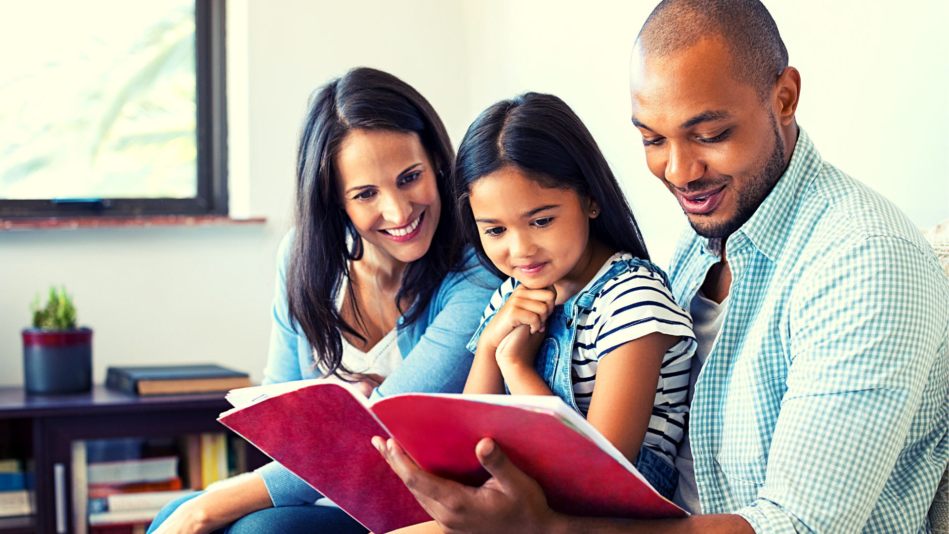 Photo of parents reading with child