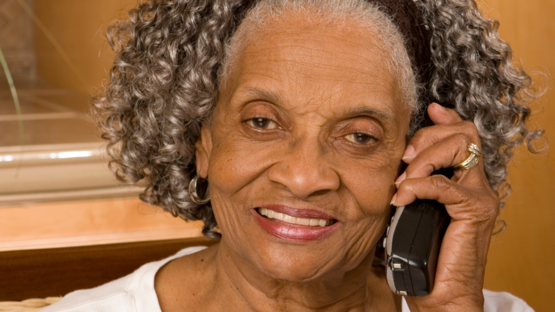 Photo of woman talking on the phone